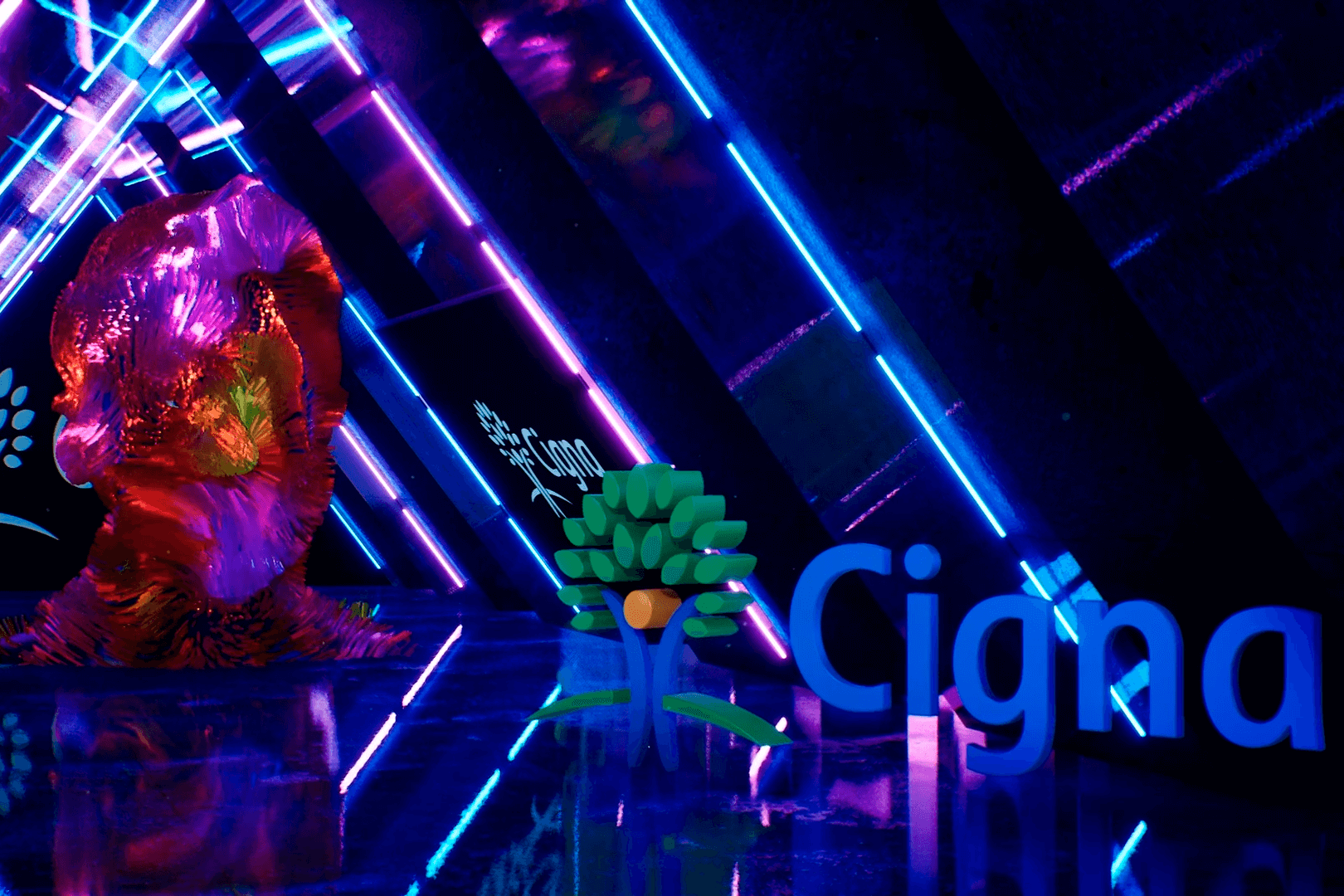 The image depicts an indoor room lit by neon strip lights arranged diagonally, creating triangular shapes. In the foreground, a virtual word 